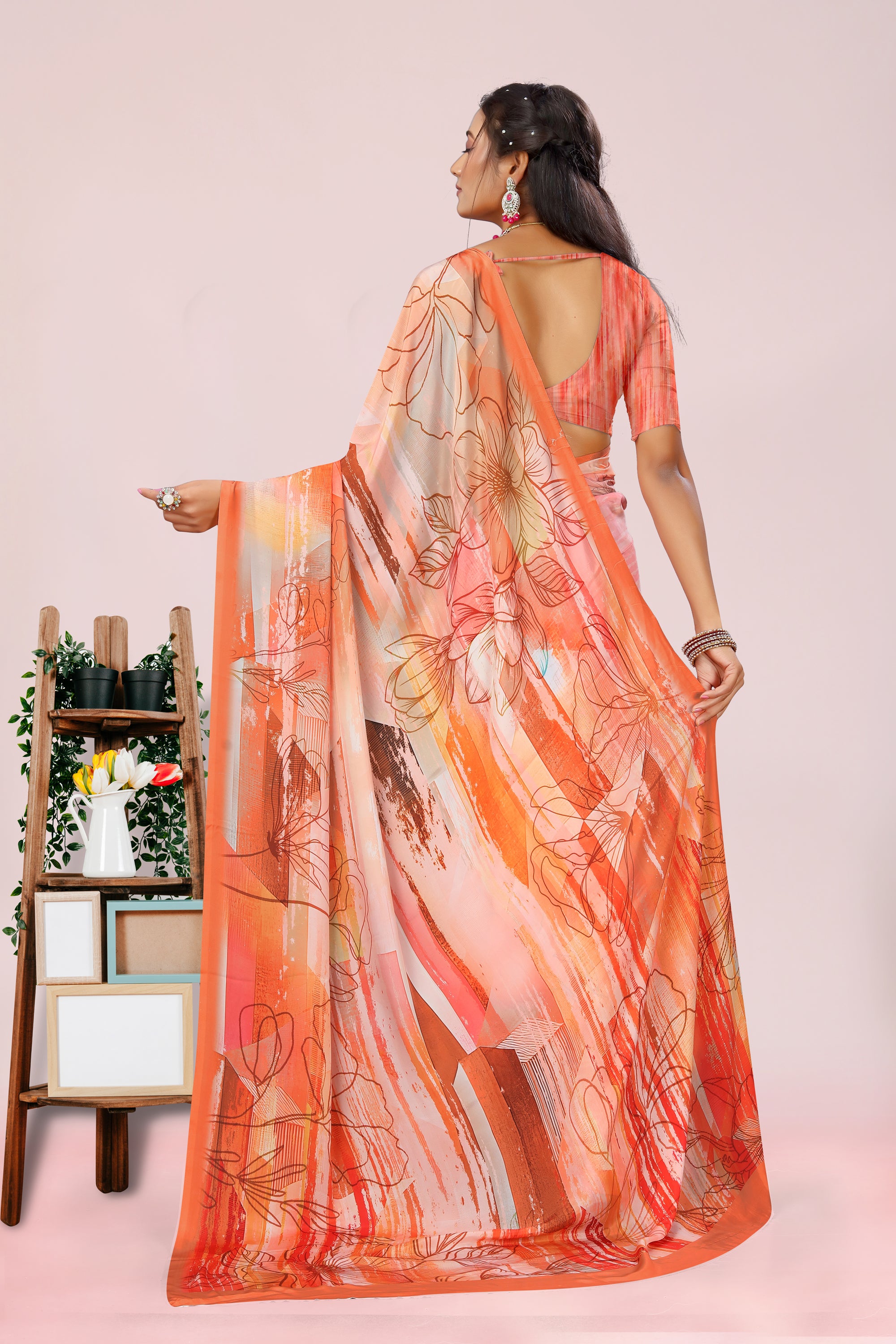 Dolly Orange Floral Crepe Saree