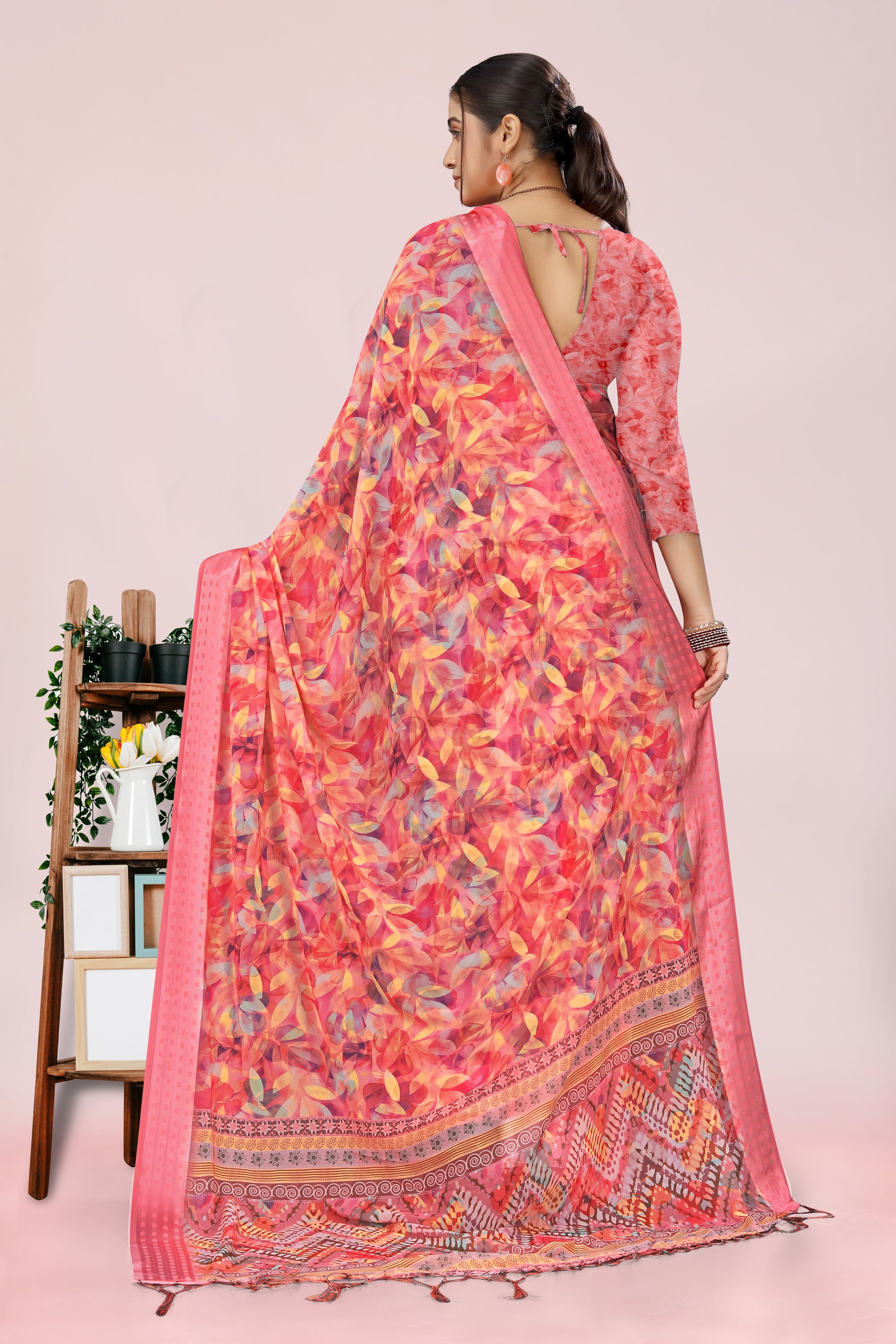 Nithi Pinkish Floral Weightless Saree