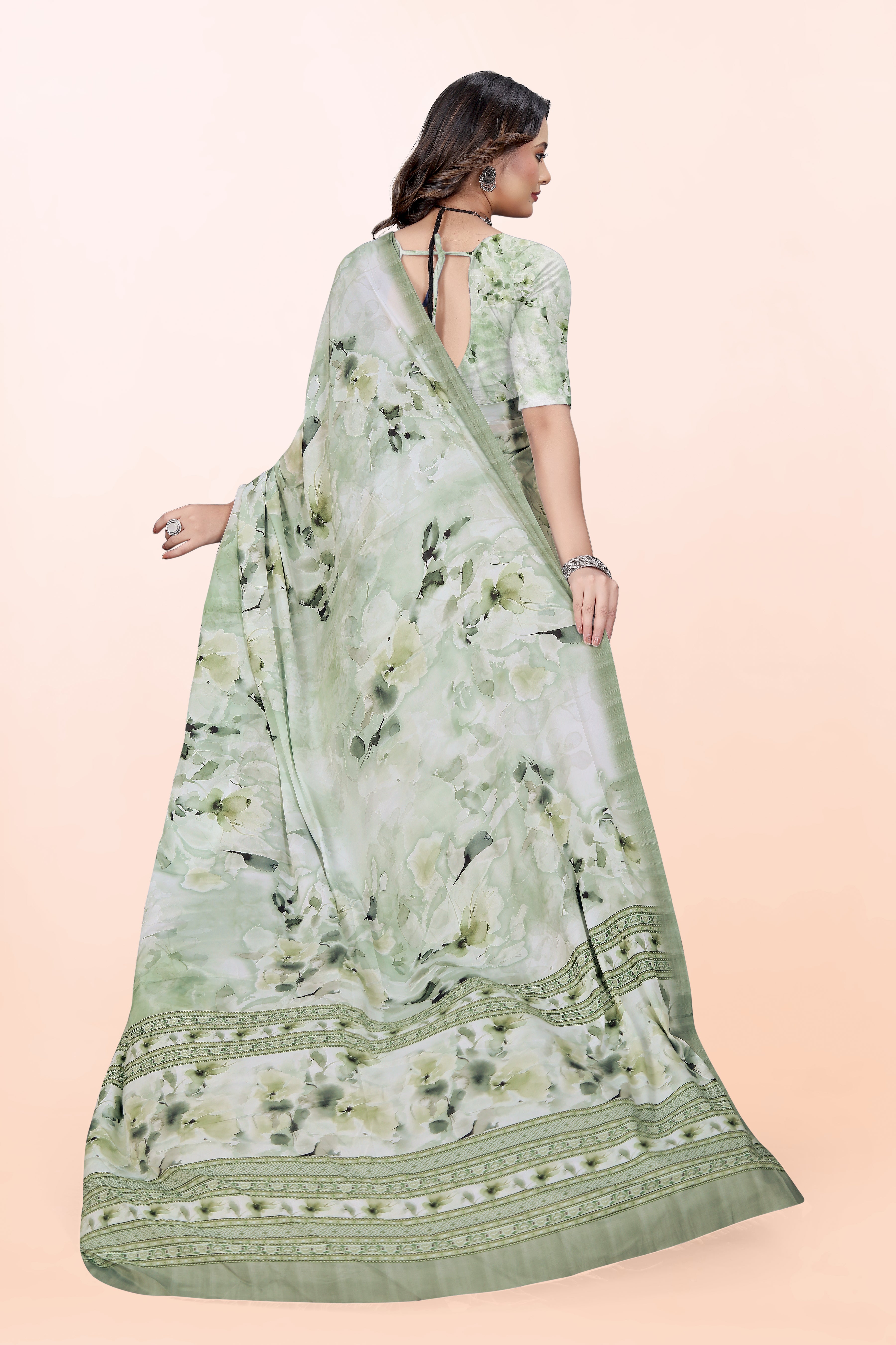 Dolly Grass Green Crepe Saree