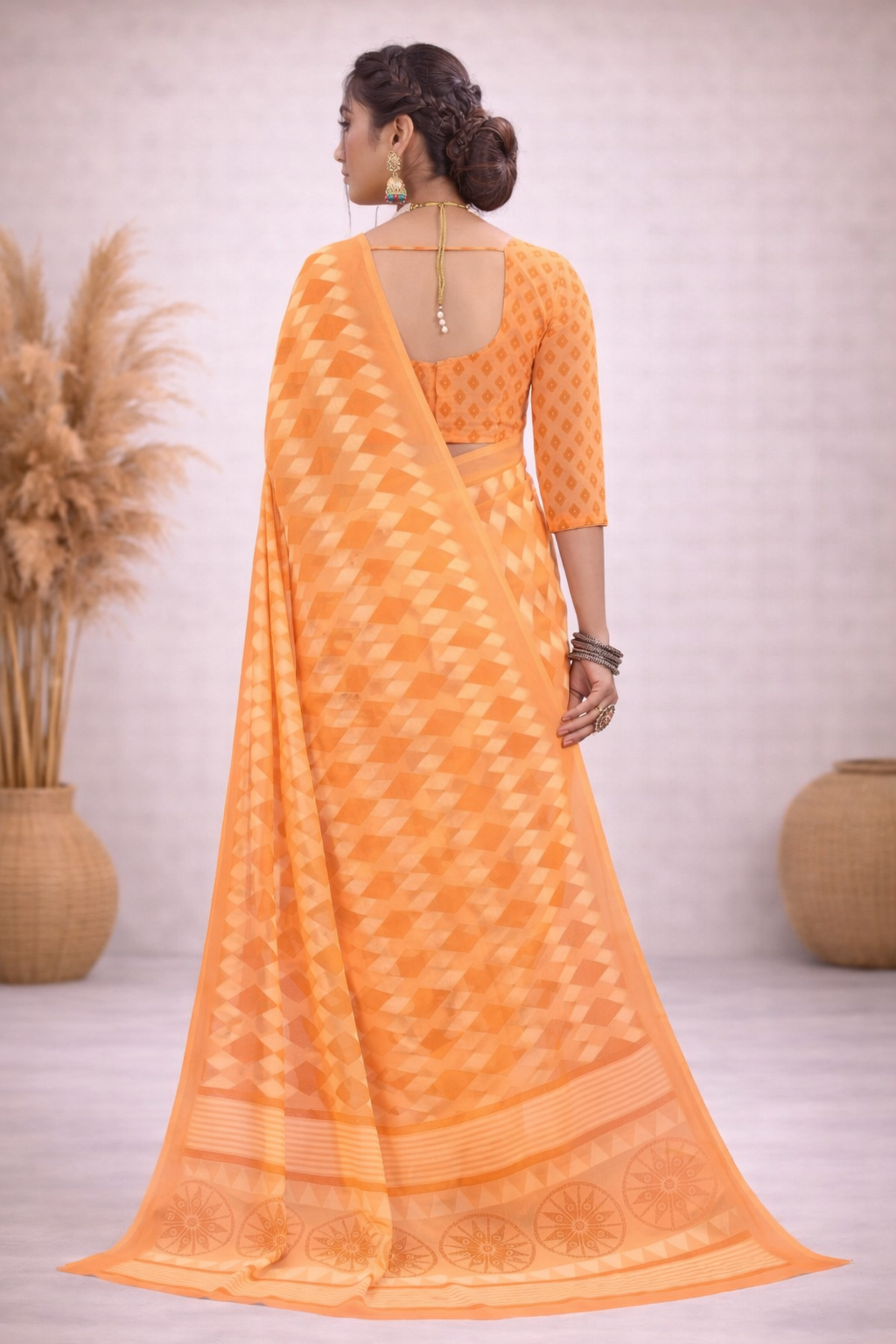 Milli Weightless Printed Saree – Elegant Peach Orange Geometric Designer Saree