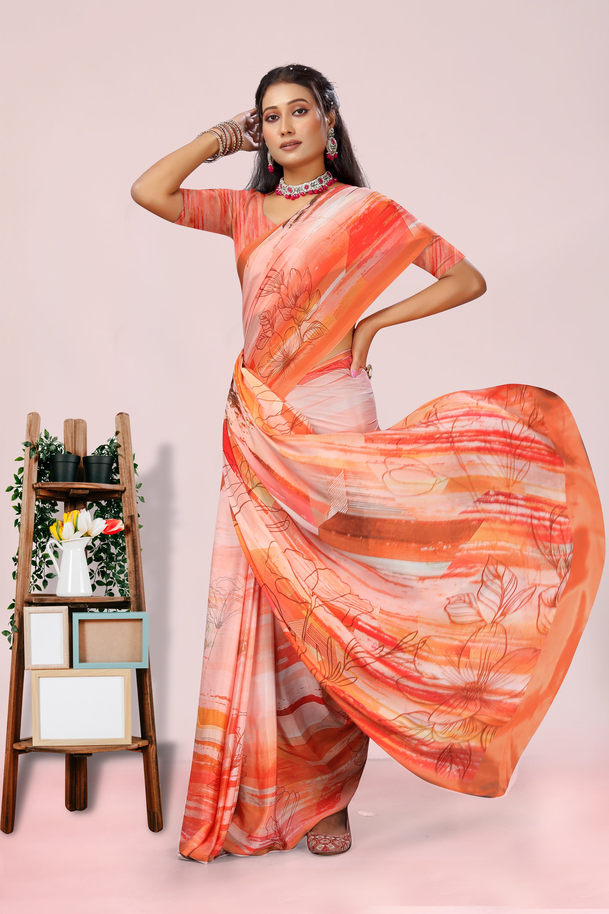 Dolly Orange Floral Crepe Saree