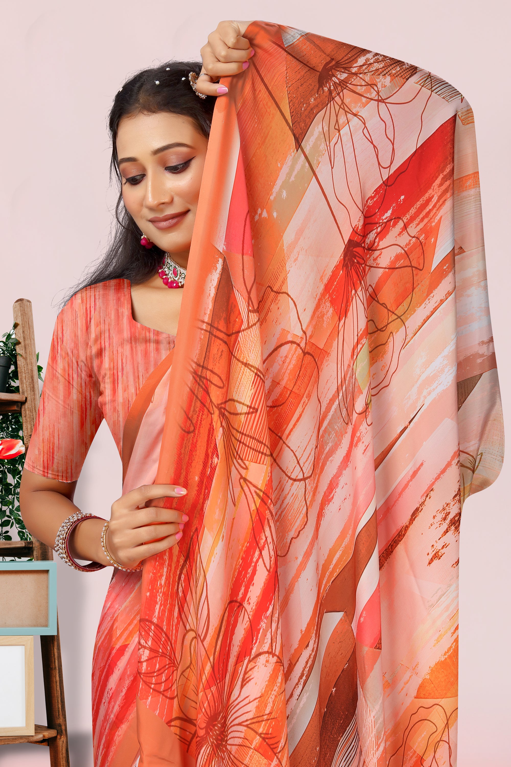 Dolly Orange Floral Crepe Saree