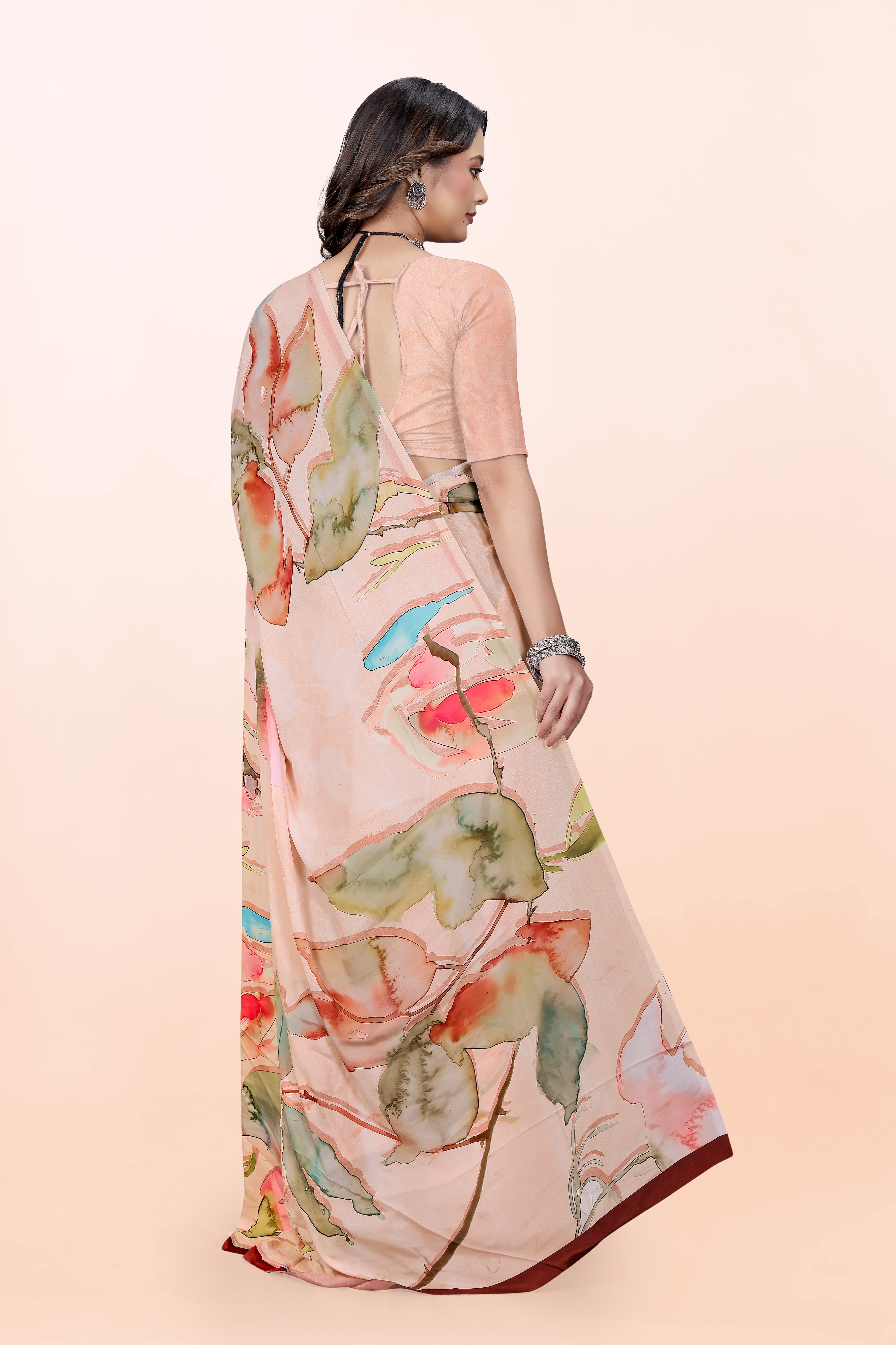 Dolly Floral peach Crepe Saree